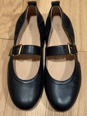 Cole Haan Black Leather Mary Jane Flats with Gold Buckle Strap